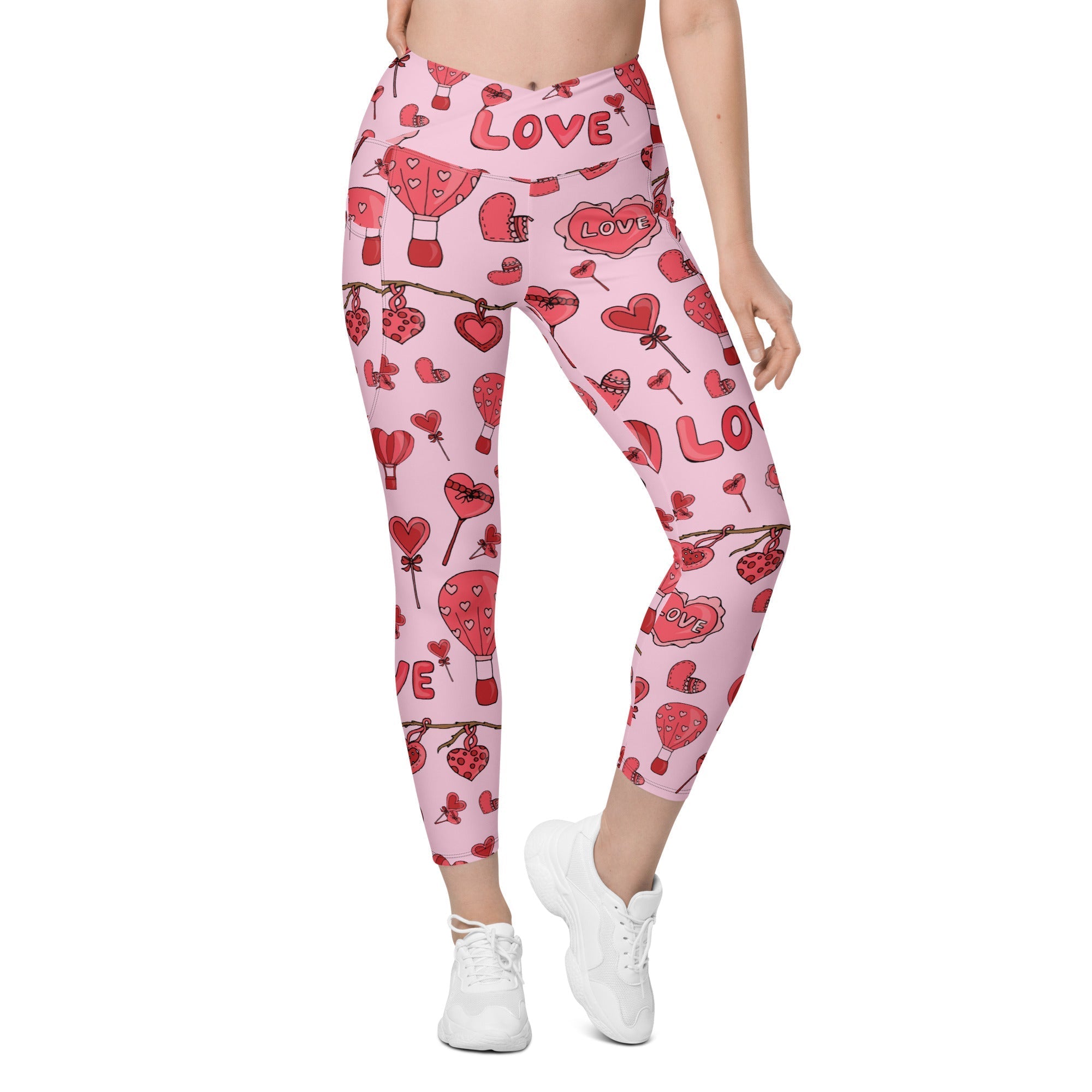 http://fiercepulse.com/cdn/shop/products/pink-love-crossover-leggings-with-pockets-fiercepulse-29792470597731.jpg?v=1672153086